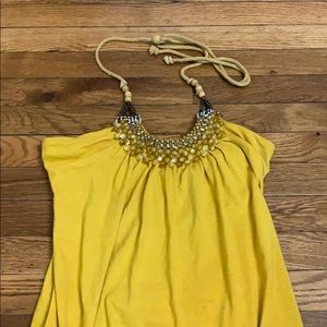Yellow tank with rope tie